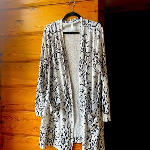 3X snake print below the knee cardigan. Black and white.